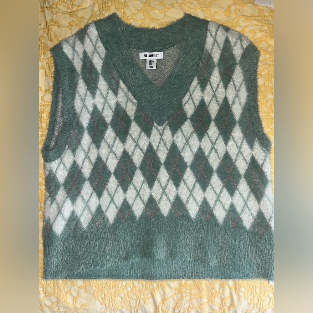 blue sweater vest